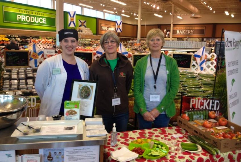 <p>Atlantic Superstore is showcasing Annapolis Valley grower partners as part of their ‘Near You’ local foods campaign. Taking part in New Minas are registered dietitian Meghan Dixon, left, and Den Haan Greenhouses representatives Doreen Chipman and Nancy Baxter, who were sampling some of the fresh produce they grow.</p>