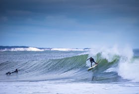 Getting outside is important all year long, and what better way to do just that in Canada’s Ocean Playground than by strolling one of its beaches or donning a wetsuit for winter surfing at Lawrencetown Beach? - Photo Courtesy Discover Halifax/Acorn Art Photography.