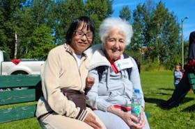 ['Susie Schule (left), and her mother, Regula, came out to the community barbecue in Happy Valley-Goose Bay on Sept. 9, marking International FASD Awareness Day.']