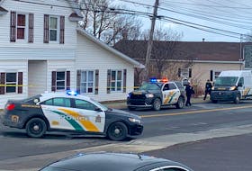 There was a heavy Cape Breton Regional Police Service presence on Mitchell Avenue in Dominion on Sunday as police began investigating the death of a 42-year-old man who was found injured on a sidewalk. Police were called to the scene at about 8:30 a.m. EHS also attended and pronounced the man deceased a short time later. Police cordoned off a crime scene that appeared to include a house located across Mitchell Avenue from the Sandbar Restaurant and Lounge. The deceased man’s name was not released. Police service communications adviser Desiree Magnus said the cause of death is as yet undetermined and that major crimes investigators are probing the incident. Traffic was diverted around the road that serves as the main route between Dominion and nearby Reserve Mines. DAVID JALA/CAPE BRETON POST