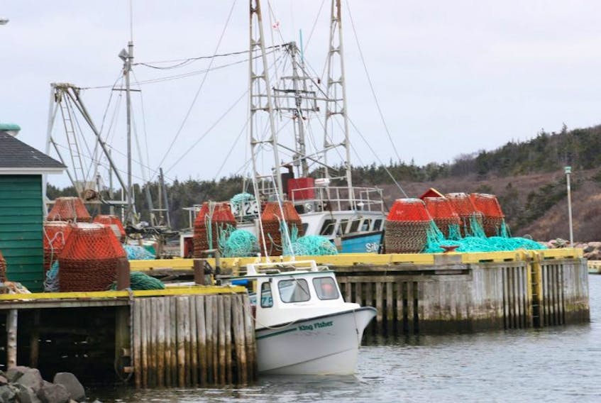 Crab pots wait to be loaded aboard boats in Fortune in this file photo.
