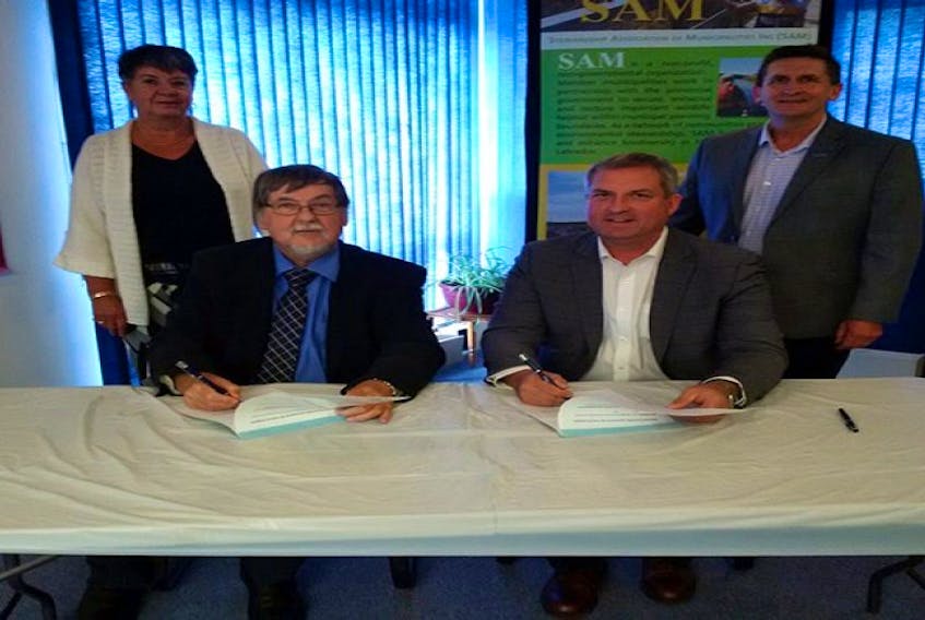 The Town of Lewisporte signed became the 39th town in Newfoundland and Labrador to sign a municipal habitat stewardship agreement with the provincial government on Wednesday. Taking part in the signing were Mayor-Elect Betty Clarke (standing, left), Lewisporte-Twillingate MHA Derek Bennett (standing, right), outgoing Mayor Brian Sceviour, (seated, left) and Fisheries and Land Resources Minister Gerry Byrne.