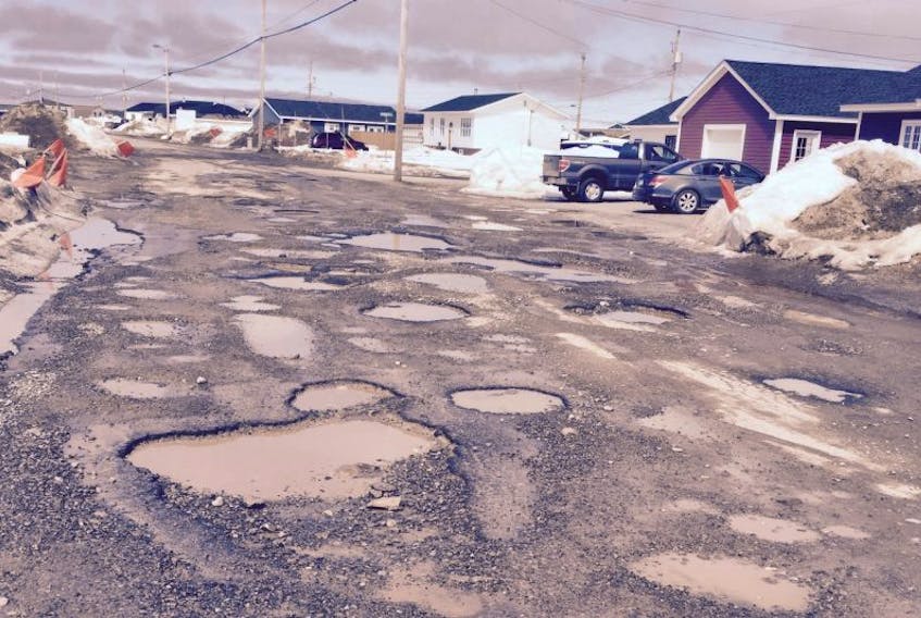 ["Main Street in Port au Choix also made the CAA's list of Worst Roads in Atlantic Canada."]