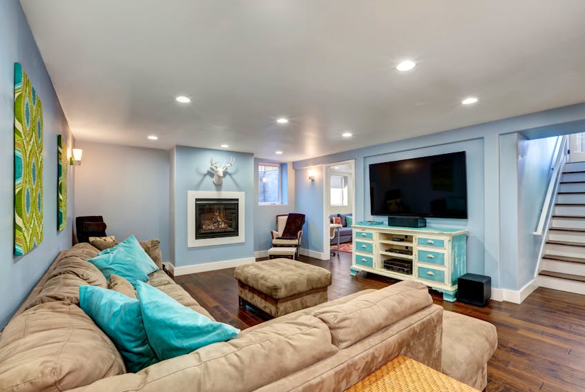 Because most basements have limited access to natural light, deciding how to artificially illuminate the space is a crucial starting point. That includes choosing a variety of lighting sources, such as recessed and sconces, but also the right finishes.