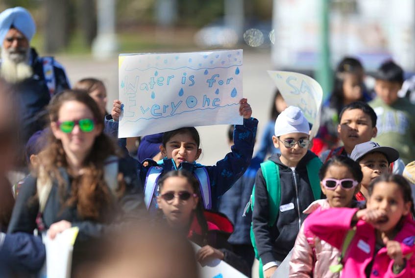 Young students attended a park near the Legislative Building in Winnipeg today, many had signs regarding water. CHRIS PROCAYLO/WINNIPEG SUN