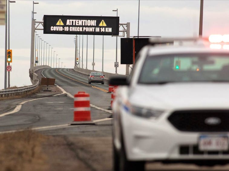 An RCMP vehicle in front of the Confederation Bridge on April 2, 2020. - REUTERS