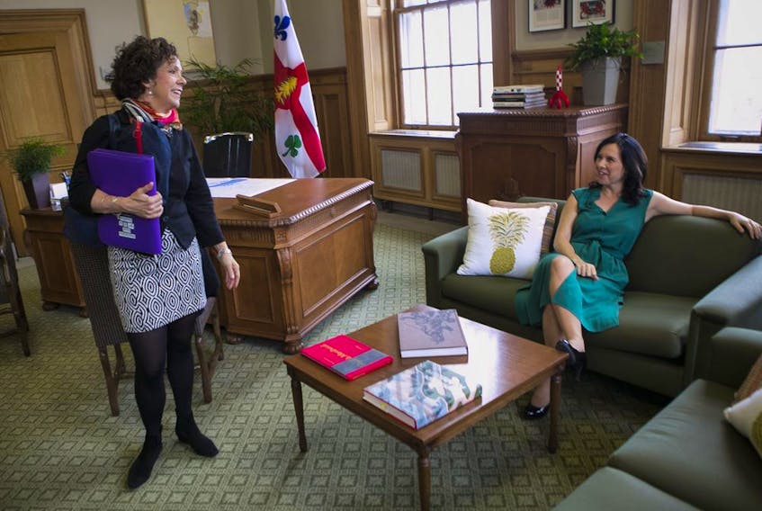 "It was exhausting to try to listen for hours on end to these guys droning on," C.D.N.-N.D.G. Mayor Sue Montgomery, seen here with Mayor Valérie Plante in a file photo, told reporters during a break in Tuesday's council meeting, adding she can better follow debates while knitting. JOHN KENNEY/MONTREAL GAZETTE