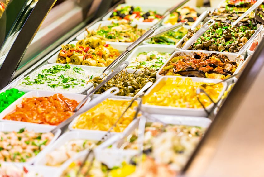 Some grocers are competing with restaurants and fast-food chains by turning part of their stores into a prepared food market, offering meals to eat on site.