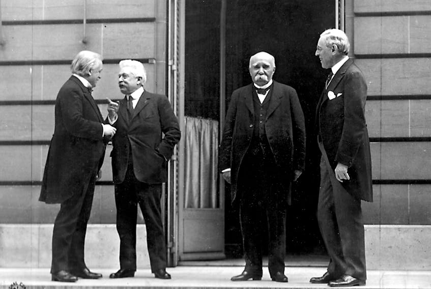 Council of Four at the WWI Paris peace conference, May 27, 1919 (candid photo) From left:  Prime Minister David Lloyd George (Great Britain) Premier Vittorio Orlando, Italy, French Premier Georges Clemenceau, U.S. President Woodrow Wilson -  Edward N. Jackson (US Army Signal Corps) - U.S. Signal Corps photo, Public Domain