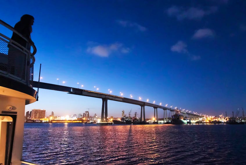 The Coronado Bridge spans San Diego Bay, the picturesque body of water that provides a playground for tourists.