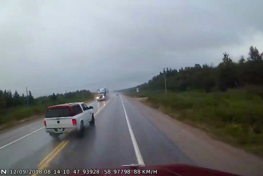 A dashcam video posted by David Knee in September shows a near-miss between a truck and a transport truck near Coal Brook on Newfoundland's west coast.