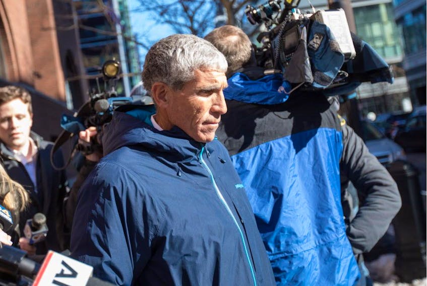 William "Rick" Singer leaves Boston Federal Court after being charged with racketeering conspiracy, money laundering conspiracy, conspiracy to defraud the United States, and obstruction of justice on March 12, 2019 in Boston, Massachusetts. Singer is among several charged in alleged college admissions scam.