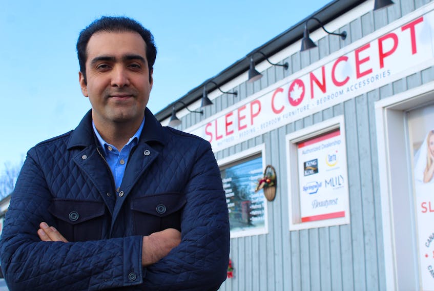Makan Rakhshan stands outside his business, SleepConcept, in Montague on April 7.