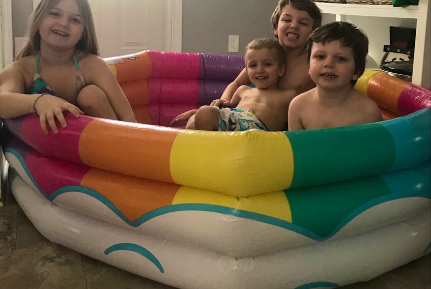 It was "beach day" for the Williams crew at their Sydney home recently. The family is staying at home as mandated by the province of Nova Scotia, to help limit the spread of COVID-19. The siblings from left, Alexa, age eight, Jameson, age three, Jake, age nine, and four-year-old Jax. CONTRIBUTED