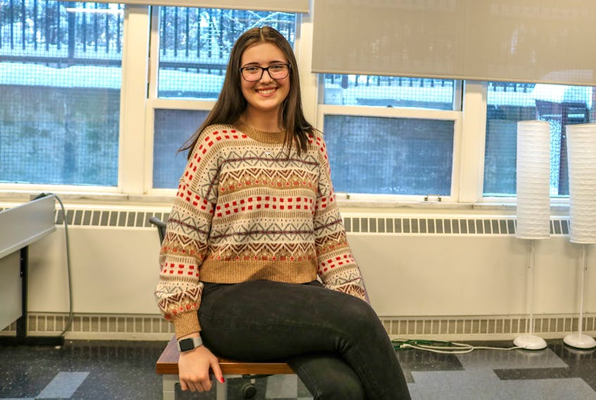Ava Graham, 17, at New Dawn Centre for Social Innovation in downtown Sydney last week. The Riverview High School student is planning to start a bachelor of science degree next year at either Cape Breton University of Dalhousie University. JESSICA SMITH • CAPE BRETON POST 