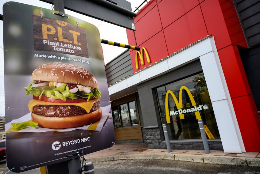 A sign promoting McDonald's P.L.T. burger with a Beyond Meat plant-based patty at one of 28 test restaurant locations in Ontario in 2019. REUTERS/Moe Doiron/File Photo
