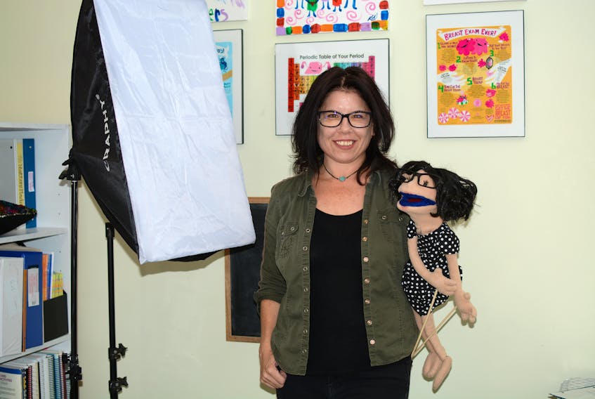 Rene Ross, executive director at the Sexual Health Centre of Cumberland County, along with her puppet Little Rene, star in videos produced by the SHCCC, including their latest video about safe partying.  Ross says the centre has received many requests for information about sexually transmitted diseases since a syphilis outbreak was officially declared in Nova Scotia last week. - File