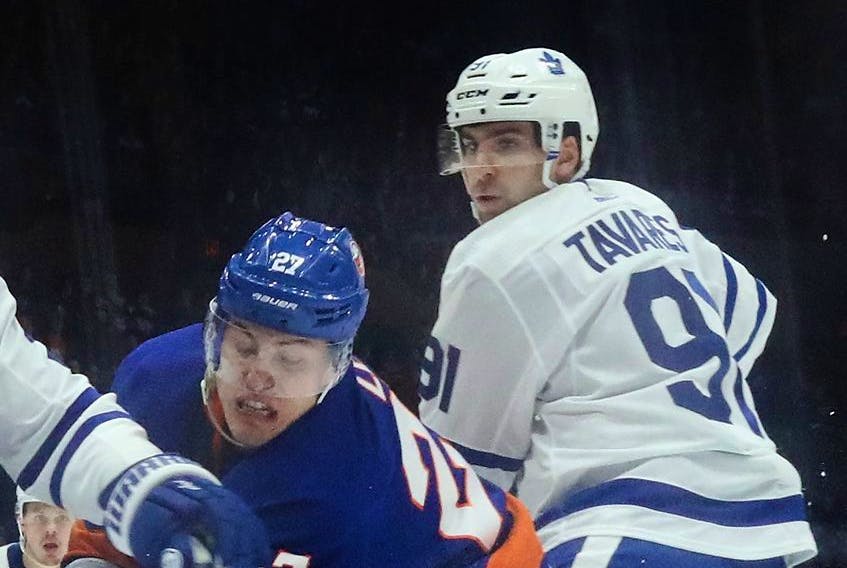 John Tavares of the Toronto Maple Leafs faces Anders Lee of the New York Islanders on April 01, 2019 in Uniondale, N.Y. (BRUCE BENNETT/Getty Images files)