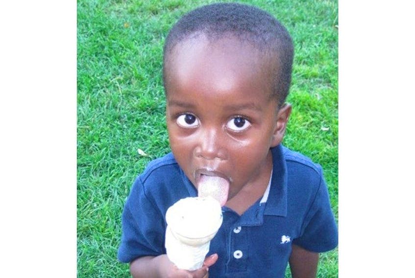 Frankie Chege from Bedford liked mint chocolate chip ice cream at Hennigar’s Farm Market.