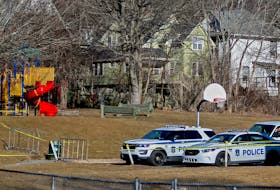 FOR NEWS:
Halifax regional police are seen behind the Findlay Center, after reports that human remains were found in a lightly wooded area, in Dartmouth Friday March 12, 2021.

TIM KROCHAK PHOTO