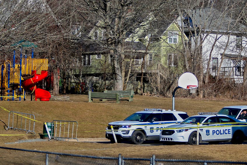 FOR NEWS:
Halifax regional police are seen behind the Findlay Center, after reports that human remains were found in a lightly wooded area, in Dartmouth Friday March 12, 2021.

TIM KROCHAK PHOTO