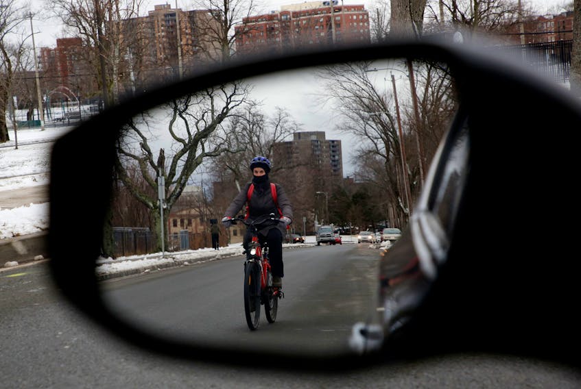 A cyclist is seen in Halifax Monday, Jan. 4, 2021. The Halifax Cycling Coalition has put forward a set of recommendations for the province's Traffic Safety Act and the regulations that accompany it.