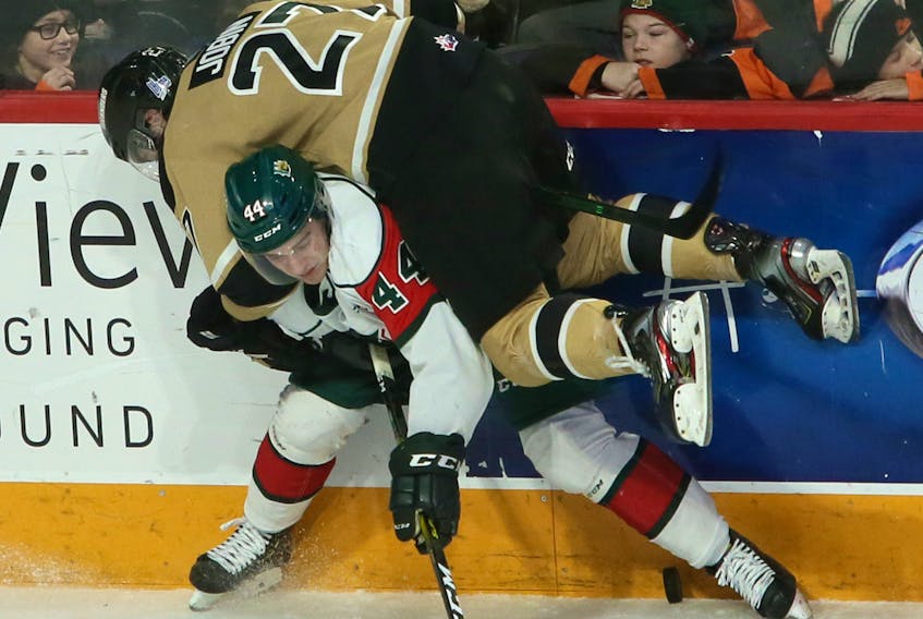 Halifax Mooseheads' Denis Toner rubs out Charlottetown Islanders' Gaetan Jobin during QMJHL action at Scotiabank Centre on Sunday. TIM KROCHAK/ The Chronicle Herald