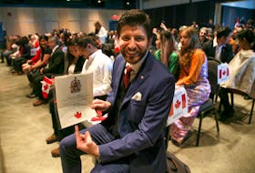 FOR DEMONT STORY:
Tareq Hadhad, CEO and founder of Peace by Chocolate, displays his Canadian citizenship, that he had just received in Halifax Wednesday January 15, 2020. Hadhad was one of  50 new citizens sworn in at a special citizenship ceremony held at the Canadian Museum of Immigration at Pier 21.

TIM KROCHAK/ The Chronicle Herald