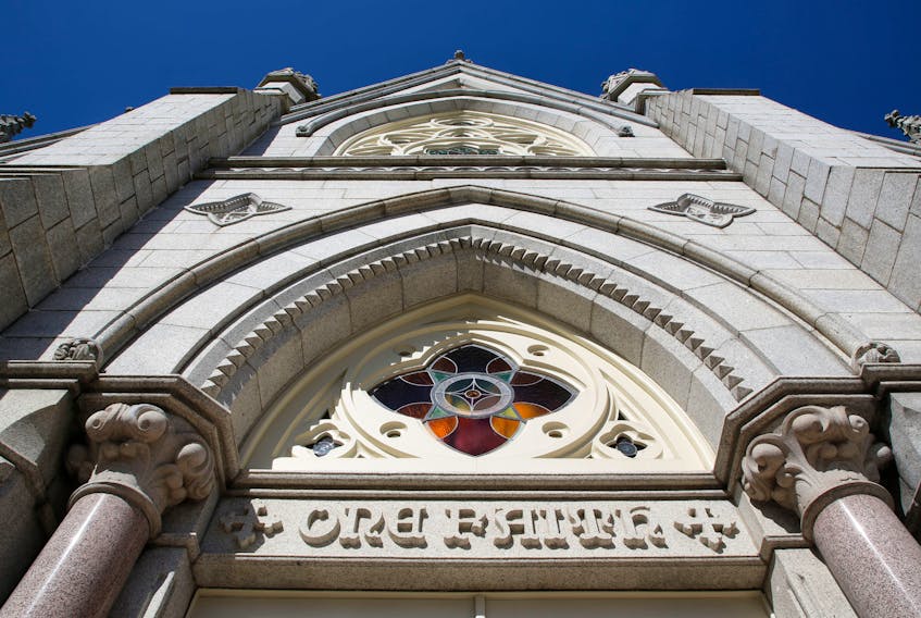 FOR CAMPBELL STORY:
ONE FAITH is inscribed above one of the three front doors on St. Mary's Basilica in Halifax Thursday March 4, 2021. For a story on no settlement yet in a class-action lawsuit by local Catholics who say they were abused by priests in the Halifax-Yarmouth diocese.

TIM KROCHAK PHOTO