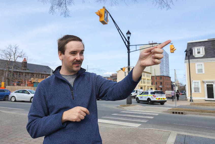 FOR MUNRO STORY:
Curtis gestures towards the area where a driver had chastised him for using a pedestrian corridor on Cornwallis at North Park Streets over lunch hour in Halifax Wednesday March 24, 20121. Earlier in the morning, he spoke to the HMR council about pedestrian safety...for MUNRO STORY.