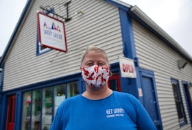 Katherine Eisenhauer, owner of The Savvy Sailor, stands in front of her cafe in Lunenburg on Monday, July 7, 2020.