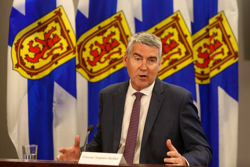 FOR RANKIN STORY:
Nova Scotia Premier Stephen McNeil, gestures to reporters after giving notice of stepping down as the premier of the province, in Halifax Thursday August 6, 2020.

TIM KROCHAK PHOTO