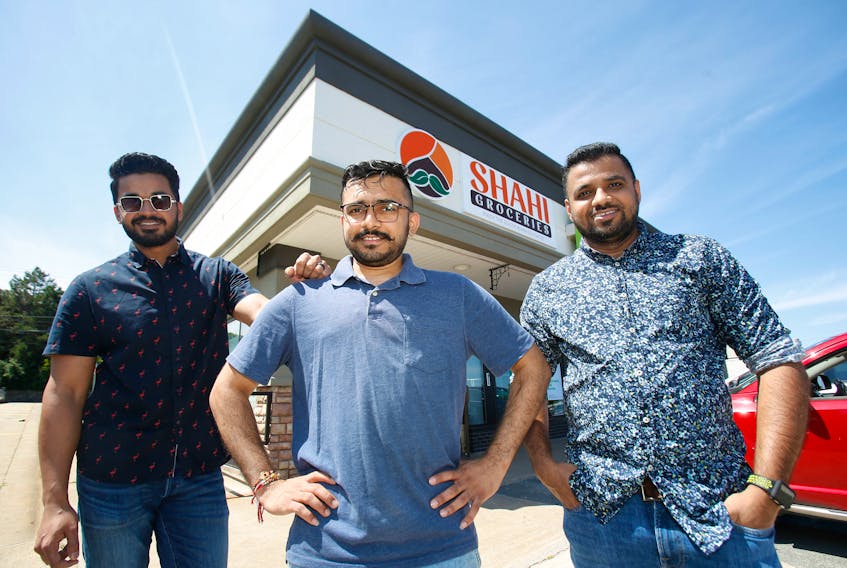 Shahzad Maredia, Nirmal Padmani and Anis Karedia are pictured outside of Shahi Groceries at the Clayton Park Shopping Centre in Halifax on Friday, August 7, 2020. The store is co-owned by Maredia, Karedia and three other South Asian immigrants who want to offer a taste of their home countries in Halifax. Padmani is the store manager.