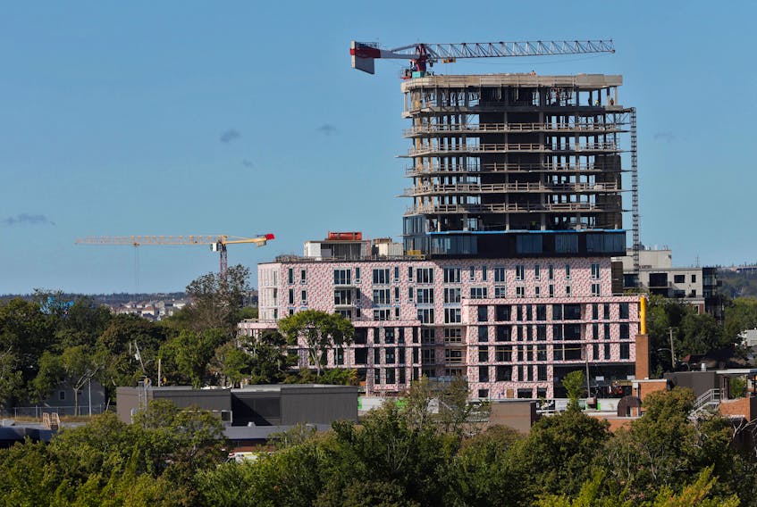 Construction cranes are seen over south-end Halifax Monday. The province was checking all crane sites in the municipality ahead of hurricane Teddy nearing the province.
