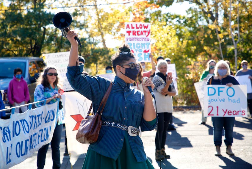 Demonstrators are seen at a rally in support of indigenous fishing rights, is seen outside the offices of local MP and Federal Minister for Fisheries Bernadette Jordan in Bridgewater, NS Friday October 16, 2020. About 150 people turned up in support.