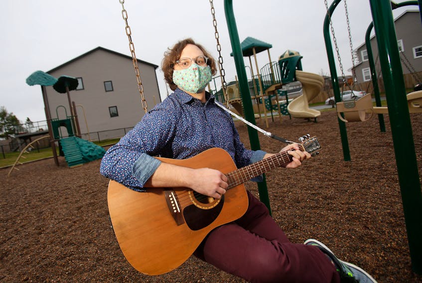 FOR LAMBIE STORY:
Substitute teacher David Paterson has been busy this school year, filling in for teachers in elementary, junior and high schools, usually with his guitar in tow....he is seen in a playground near his Bedford home Thursday November 26, 2020.

TIM KROCHAK PHOTO