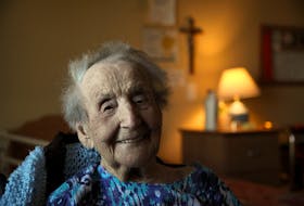 Sadie Graham, a 107-year-old survivor of the Halifax explosion, enjoys a visit at her residence in Dartmouth on Thursday.
- Tim Krochak