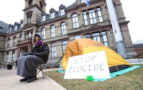 FOR CAMPELL STORY:
Since Tuesday, Jacob Fillmore has been seen camped out in front of City Hall, seen in Halifax Thursday December 17, 2020. He is reacting to an injunction recently served against forest defenders near Digby. " I came to the decision to camp out on Grand Parade in protest against the Nova Scotia Government’s inaction regarding key environmental issues and in support of those who defied the injunction to protect mainland moose habitat.
I strongly believe that there is no denying we are in the middle of a climate and ecological crisis."

TIM KROCHAK PHOTO