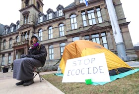 FOR CAMPELL STORY:
Since Tuesday, Jacob Fillmore has been seen camped out in front of City Hall, seen in Halifax Thursday December 17, 2020. He is reacting to an injunction recently served against forest defenders near Digby. " I came to the decision to camp out on Grand Parade in protest against the Nova Scotia Government’s inaction regarding key environmental issues and in support of those who defied the injunction to protect mainland moose habitat.
I strongly believe that there is no denying we are in the middle of a climate and ecological crisis."

TIM KROCHAK PHOTO