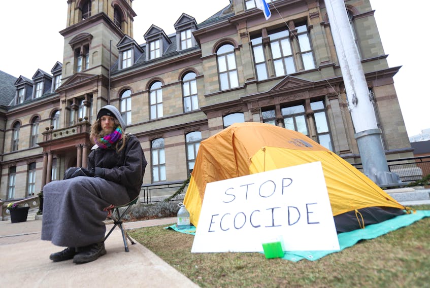 FOR CAMPELL STORY:
Since Tuesday, Jacob Fillmore has been seen camped out in front of City Hall, seen in Halifax Thursday December 17, 2020. He is reacting to an injunction recently served against forest defenders near Digby. " I came to the decision to camp out on Grand Parade in protest against the Nova Scotia Government’s inaction regarding key environmental issues and in support of those who defied the injunction to protect mainland moose habitat.
I strongly believe that there is no denying we are in the middle of a climate and ecological crisis."

TIM KROCHAK PHOTO