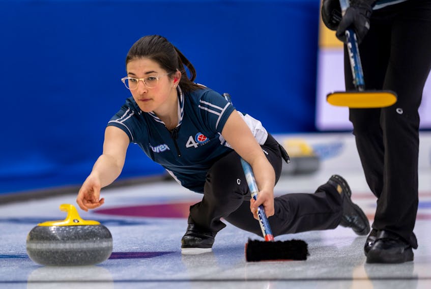 Emma Logan, the lead for Nova Scotia's Jill Brothers rink, throws a stone at the Scotties Tournament of Hearts on Tuesday.  - Andrew Klaver