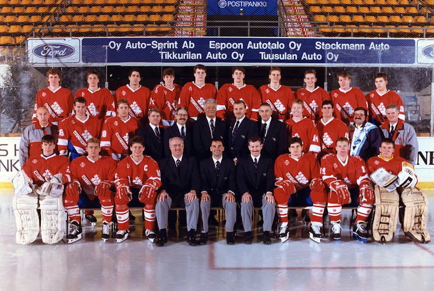 Hockey Canada images
Members of the 1990 Canadian world junior squad are, from left, first row: Stephane Fiset, Dan Ratushny, Dave Chyzowski, assistant coach Dick Todd, head coach Guy Charron, assistant coach Perry Pearn, Mike Ricci, Kris Draper, Trevor Kidd; second row: unidentified, Stu Barnes, Scott Pellerin, unidentified, unidentified, unidentified, unidentified, unidentified, Mike Needham, Dwayne Norris, unidentified, unidentified; third row: Mike Craig, Stuart Malgunas, Adrien Plavsic, Patrice Brisebois, Eric Lindros, Kent Manderville, Kevin Haller, Jason Herter, Steven Rice and Wes Walz.