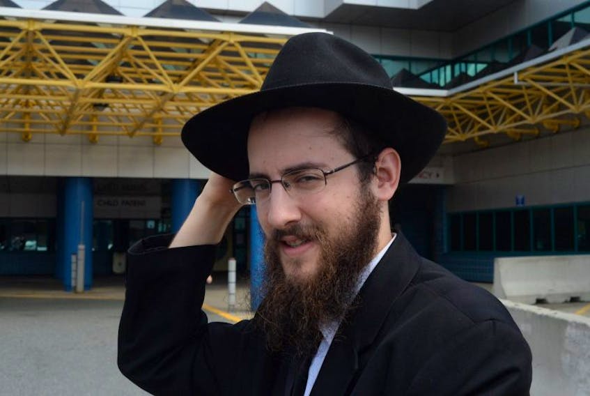 Rabbi Chanan Chernitsky, director of Chabad of Newfoundland, at the Janeway Children’s Hospital on Thursday afternoon, where he handed out teddy bears to patients.