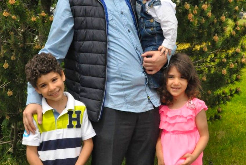 Ibrahim Al-Nahhal (centre) moved to St. John’s last May to begin working towards his PhD in electrical engineering. Joining him on his Canadian adventure were his young family consisting of son Saif (left), daughter Aisha (right), and wife Israa (not pictured), who gave birth to their son Osama not long after their arrival in Canada.
