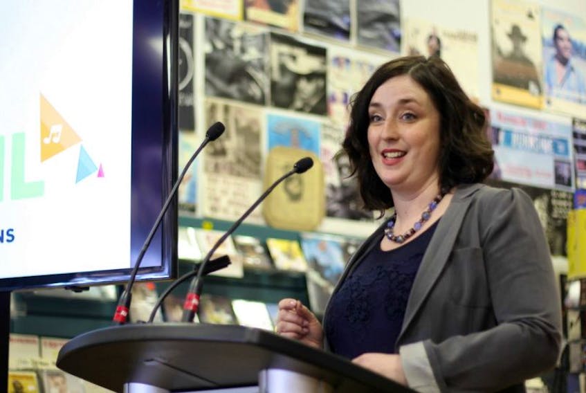 Rebekah Robbins, MusicNL’s director of programs, marketing and communications, explains the organization’s new export development program for local artists during a news conference at Fred’s Records in St. John’s Thursday morning.