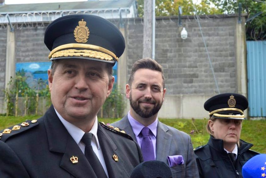 Owen Brophy (left), superintendent of prisons for Newfoundland and Labrador, speaks to reporters Wednesday afternoon at Her Majesty’s Penitentiary in St. John’s. Looking on are Minister of Justice and Public Safety Andrew Parsons and Asst. Supt. Dianna Gibbons.
