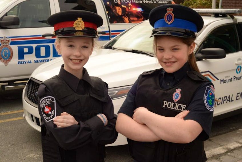 Taylor Hayes, 12, (left) a Grade 6 student at Mary Queen of the World and Katie Leaman, 10, a Grade 5 student at Morris Academy.