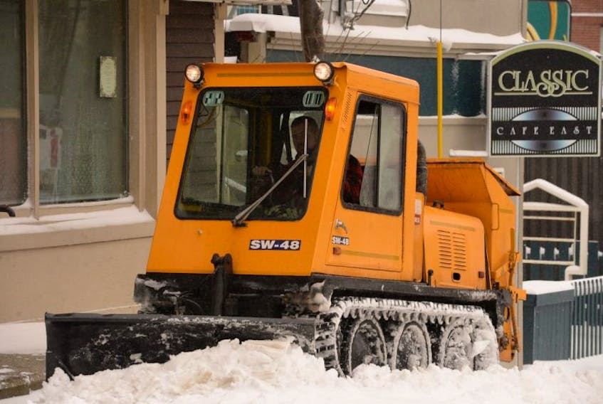 The snow day holiday on Tuesday allowed capital city snowclearing crews to gain easy access for the clearing of streets and sidewalks, such as this sidewalk plow at work on Duckworth Street.