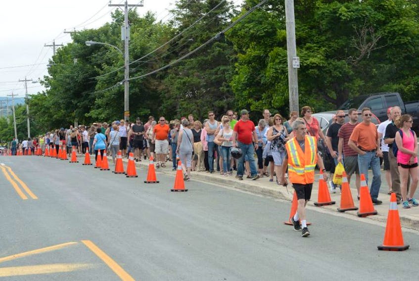 People line up for Chase the Ace tickets in Goulds on Wednesday.