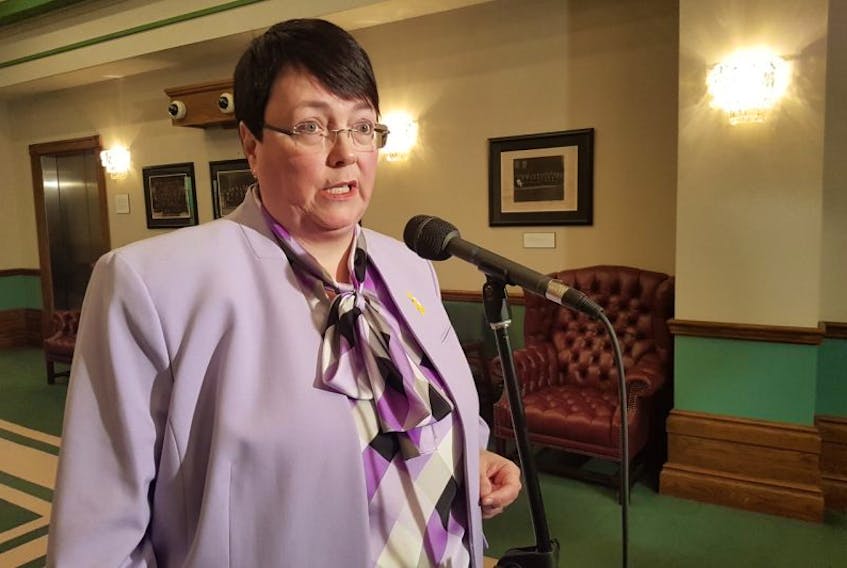 Finance Minister Cathy Bennett would not give details of the $283 million in spending cuts made in this year’s budget. Opposition leader Paul Davis said he thinks layoffs are coming.